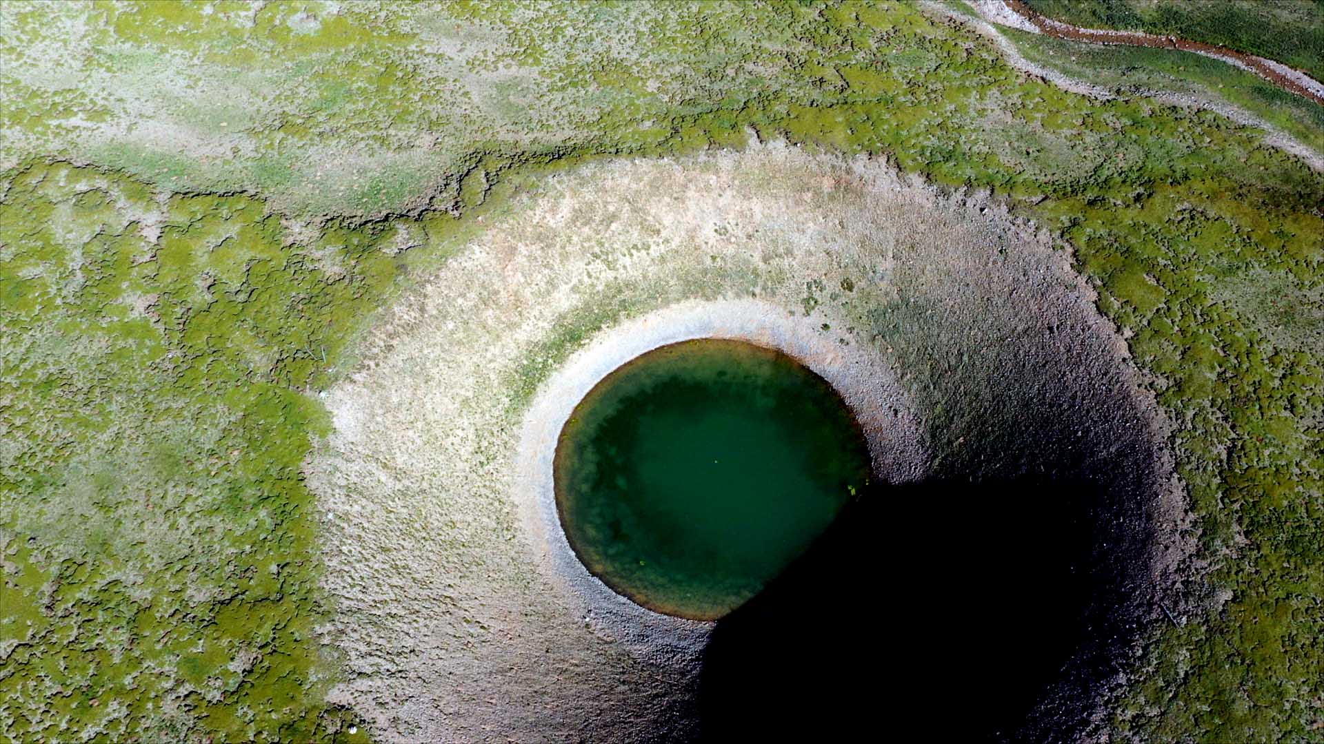 This aerial photo shows a view of paleokarst landform in Yushu Tibetan Autonomous Prefecture, northwest China's Qinghai Province, June 28, 2023. Researchers have found typical paleokarst landforms in the Sanjiangyuan area in northwest China's Qinghai Province, which further challenges the hypothesis that the area was once covered by a large ice sheet during the Quaternary period. TO GO WITH 